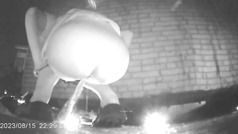 Chinese girl with a powerful stream peeing in a hidden corner of a night market 2