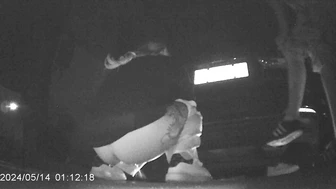 Two desperate girls peeing in a hidden spot of a Chinese night market under the guidance of a staff member
